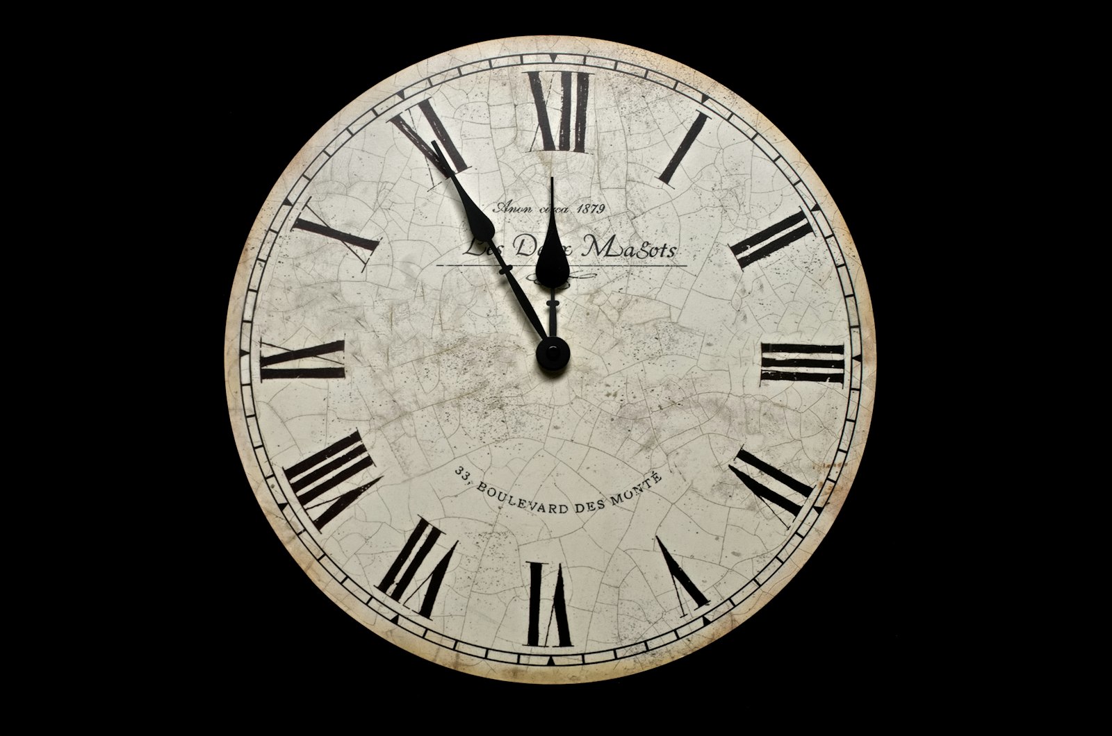 An antique clock face with a cracked dial. Replacement image for a lost original.