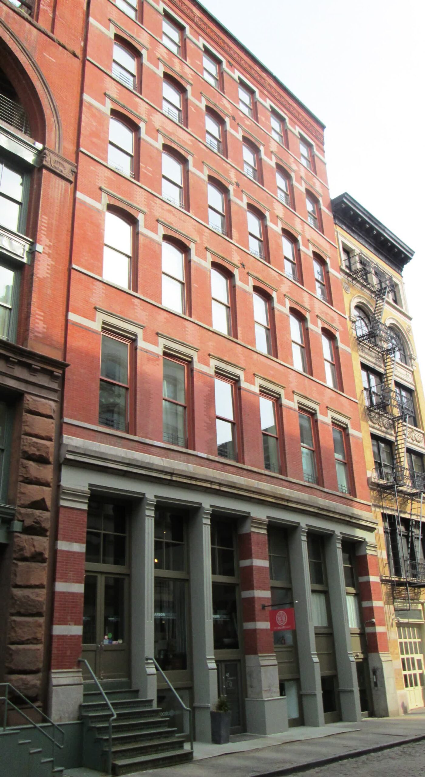 The Romanesque Revival facade of 42-44 Wooster Street in SoHo