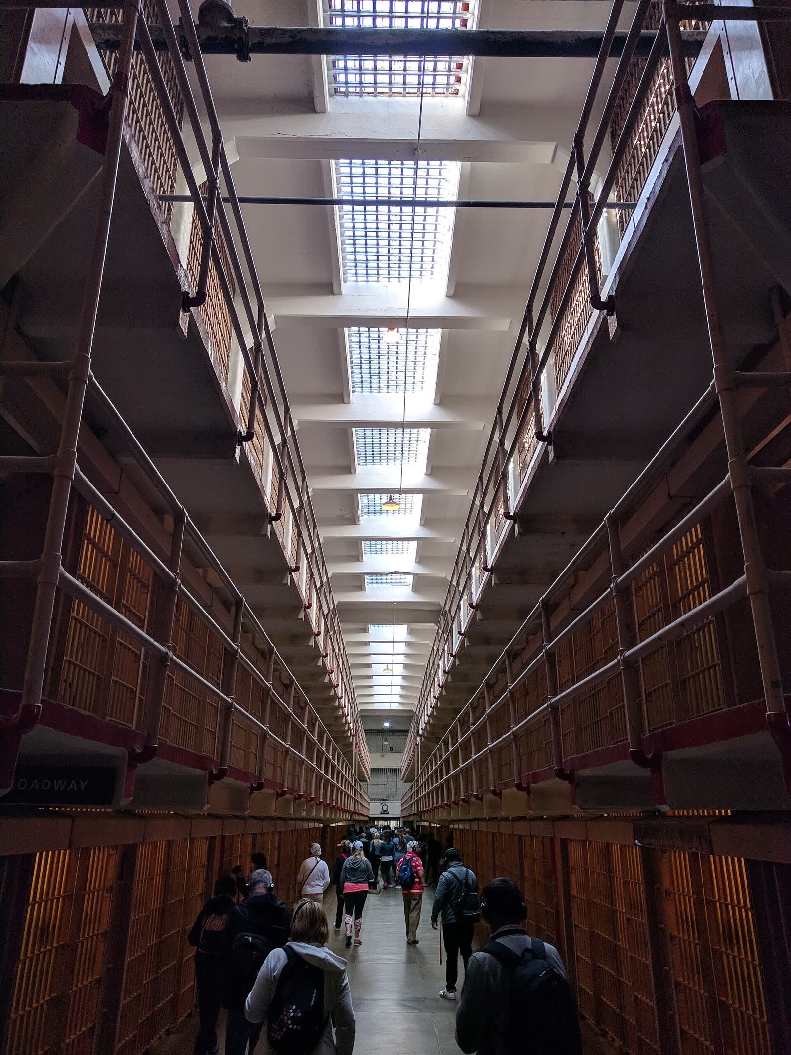 The long central corridor of the Alcatraz cellhouse between tiers of barred cells