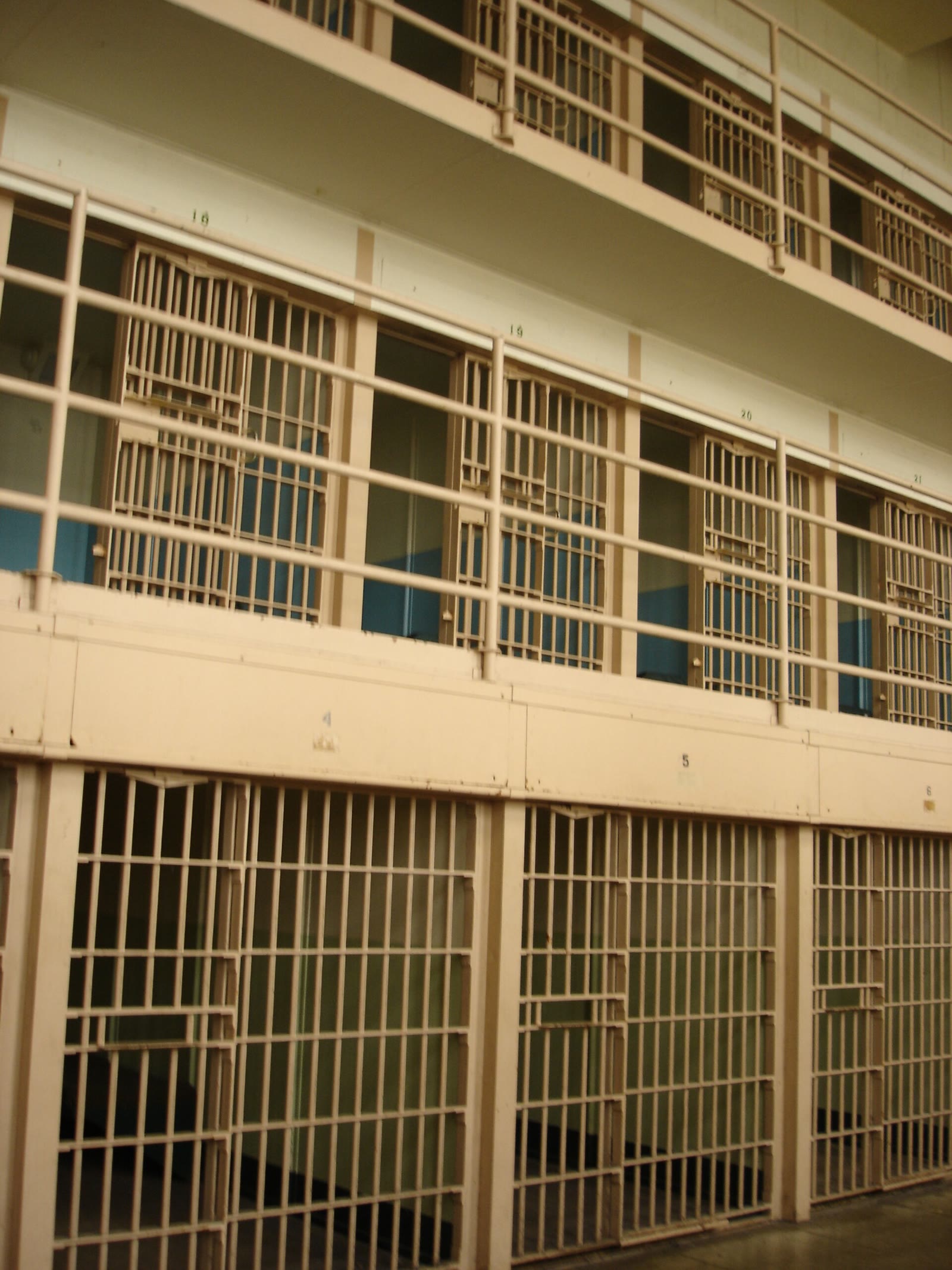 Open solitary confinement cells along D Block at Alcatraz