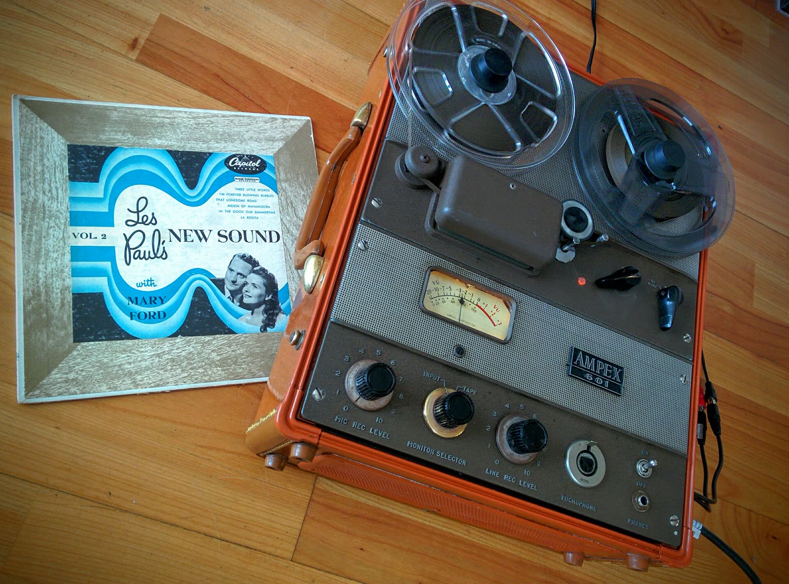 An Ampex 601 reel-to-reel tape recorder from about 1956, running in record mode