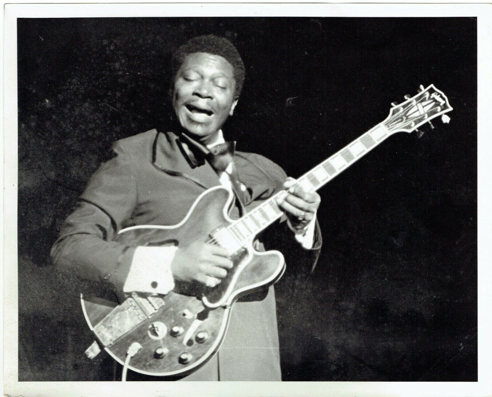 B.B. King playing guitar on stage at the Fillmore East in New York