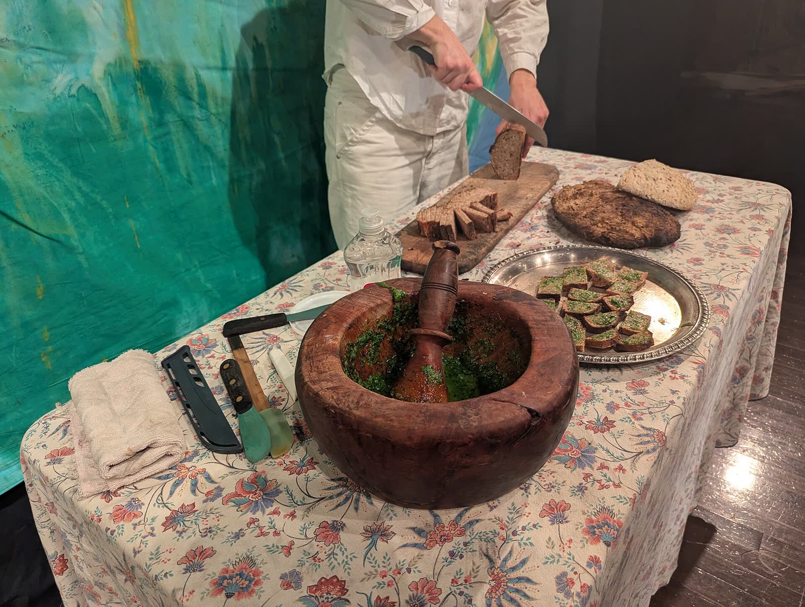Slices of sourdough rye bread with aioli served after a Bread and Puppet Theater performance