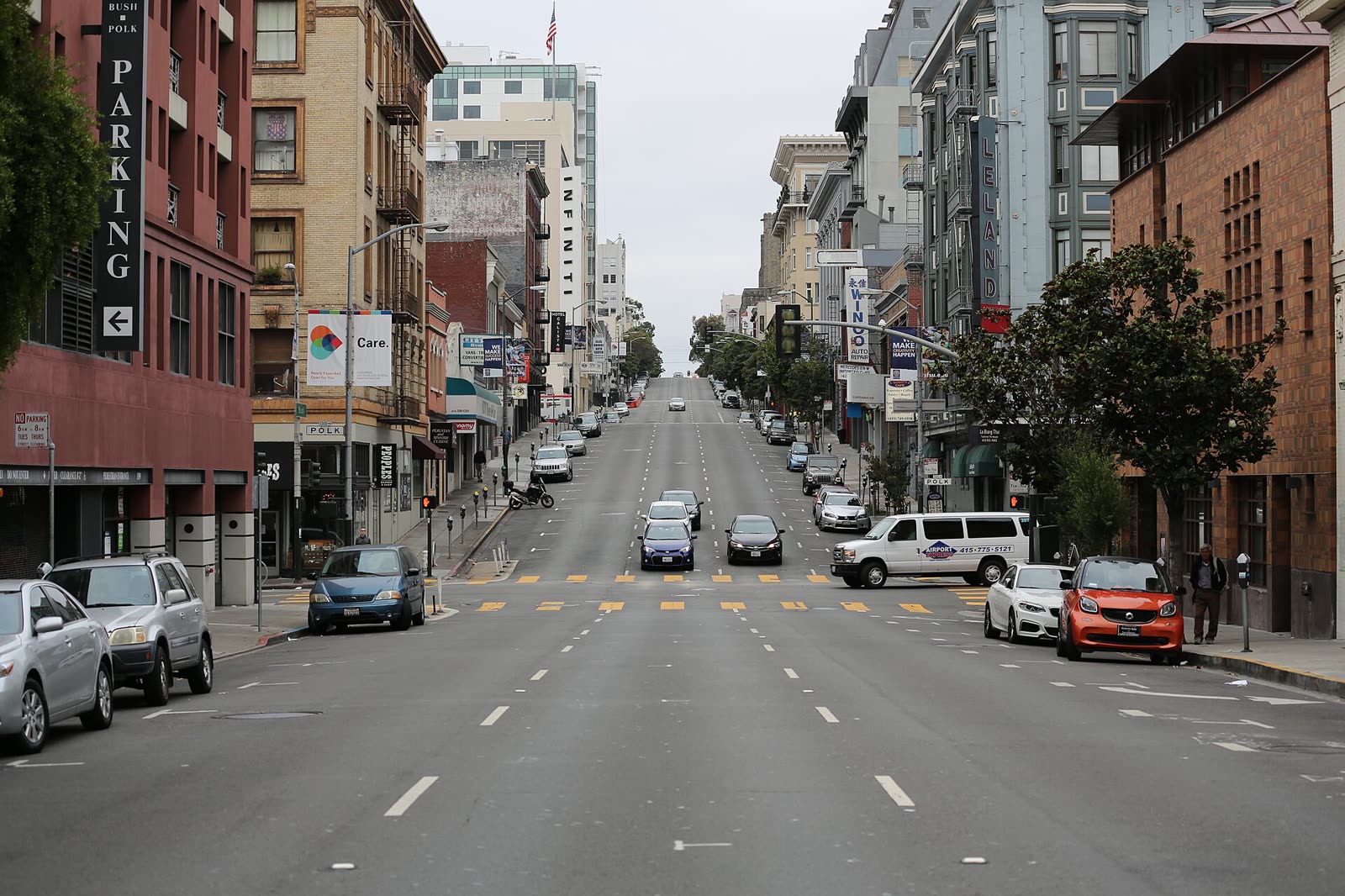 A view along Bush Street in San Francisco with buildings on both sides, 2016