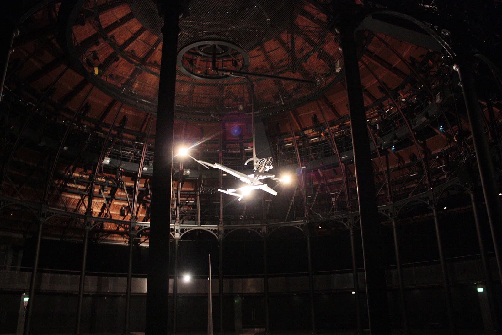 Inside the Camden Roundhouse, showing the ring of iron columns and the roof structure