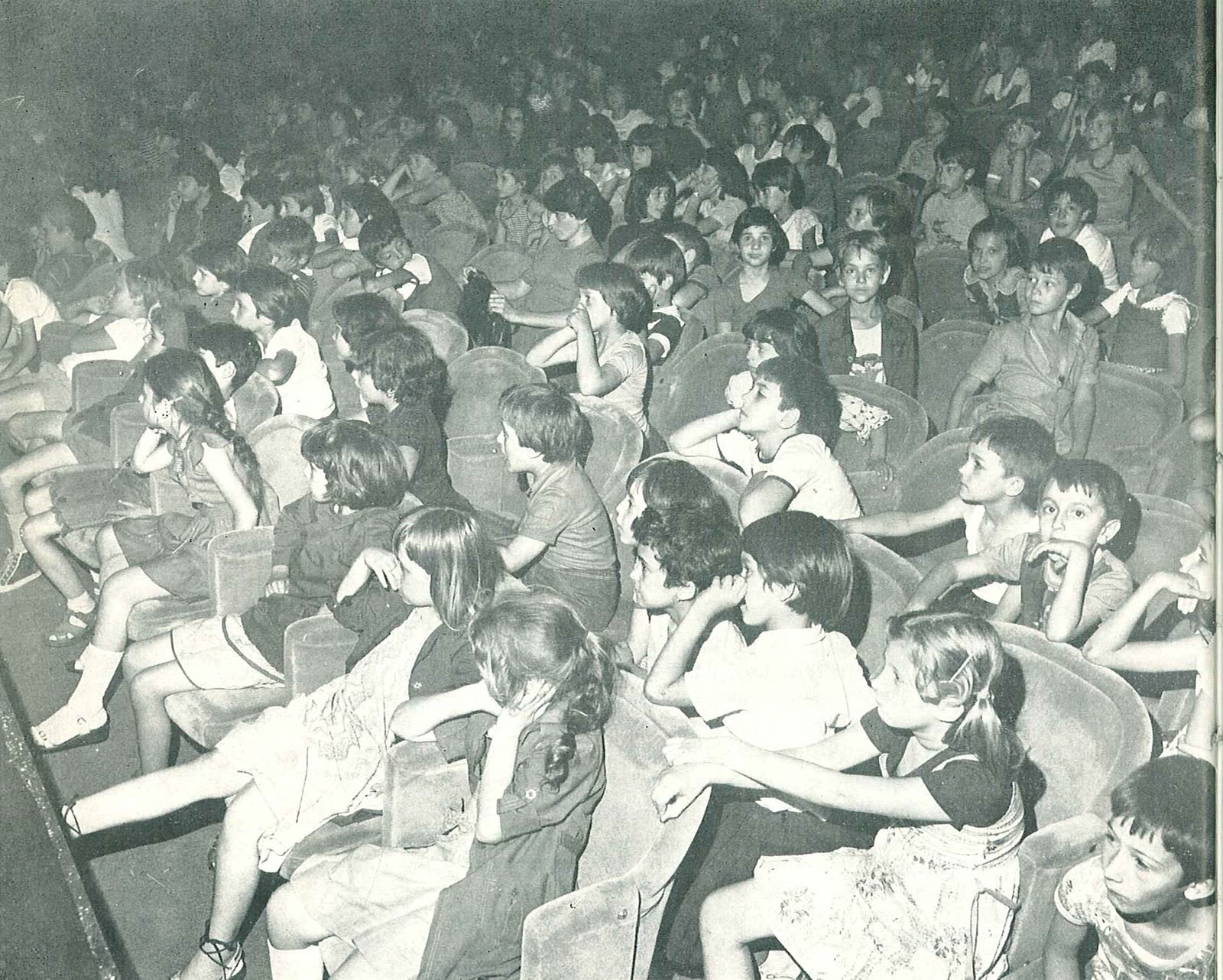 Rows of children seated in the audience of the Little Theatre Duško Radović in Belgrade