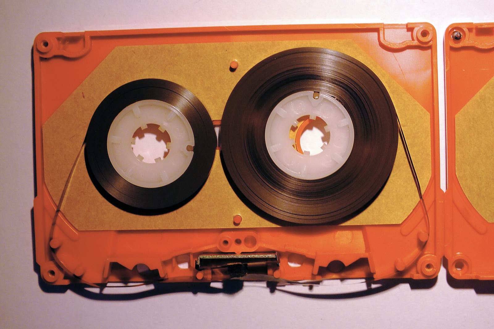 Close-up of the magnetic tape inside an opened compact cassette
