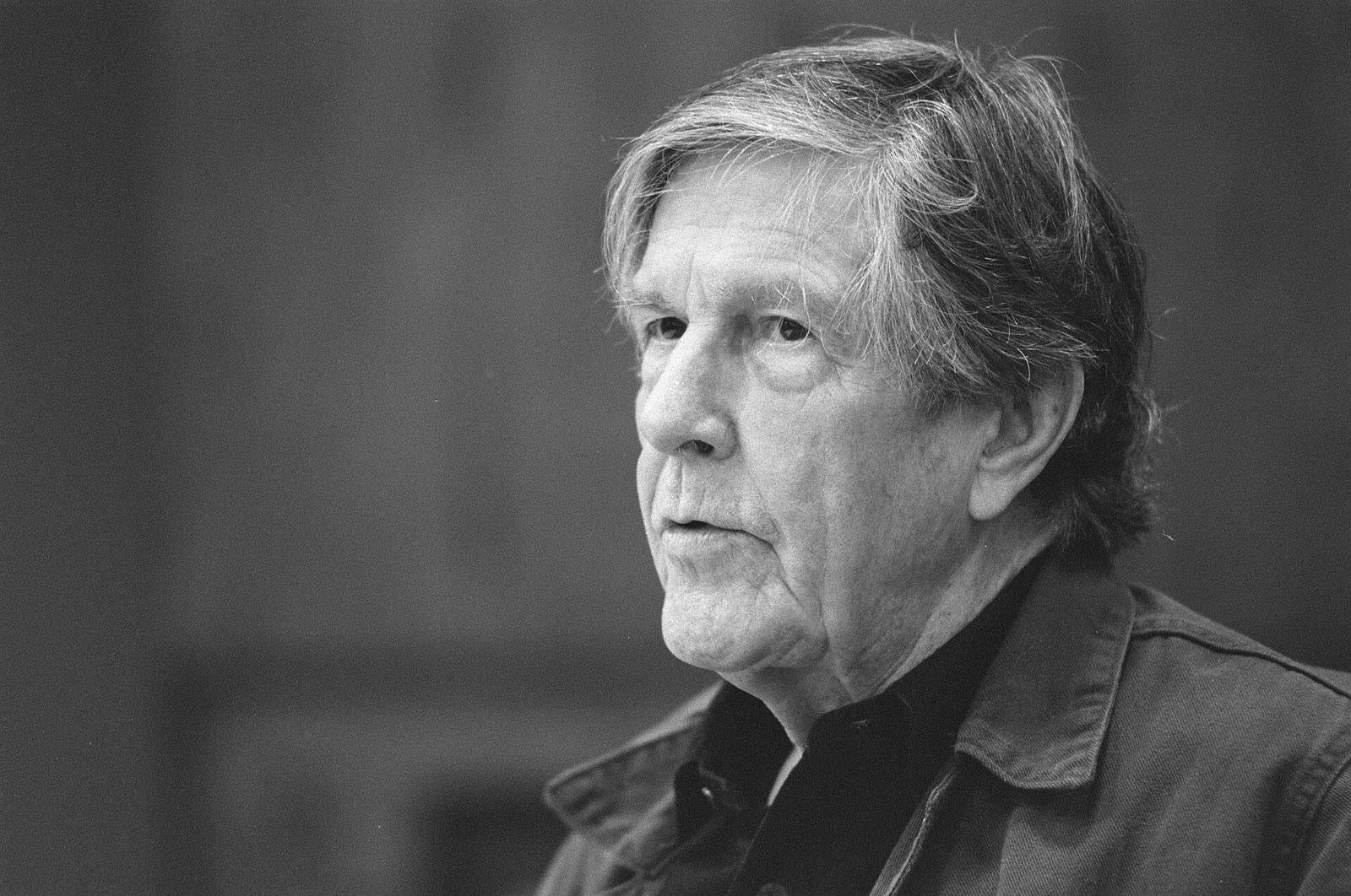 Head and shoulders photograph of the composer John Cage in November 1988