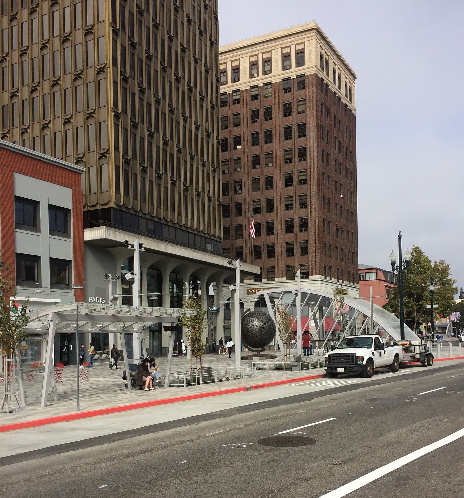 The renovated plaza, bus stop and main entrance of Downtown Berkeley BART station, seen from Shattuck Avenue in 2018