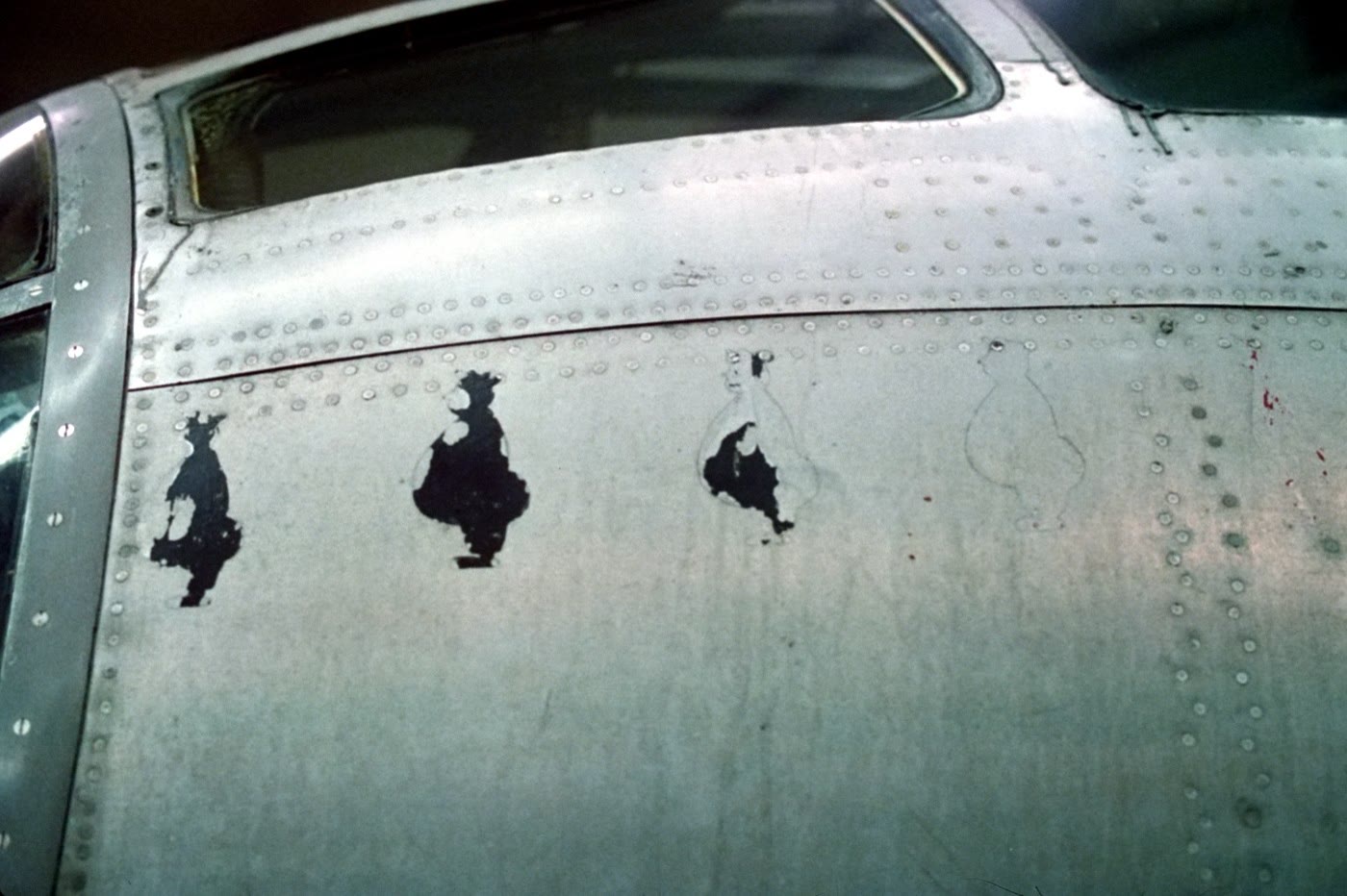 The Enola Gay's nose below the cockpit windows, photographed in Smithsonian storage in 1987
