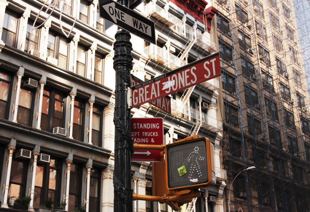 Great Jones Street at its corner with Broadway in Lower Manhattan, lined with older loft buildings