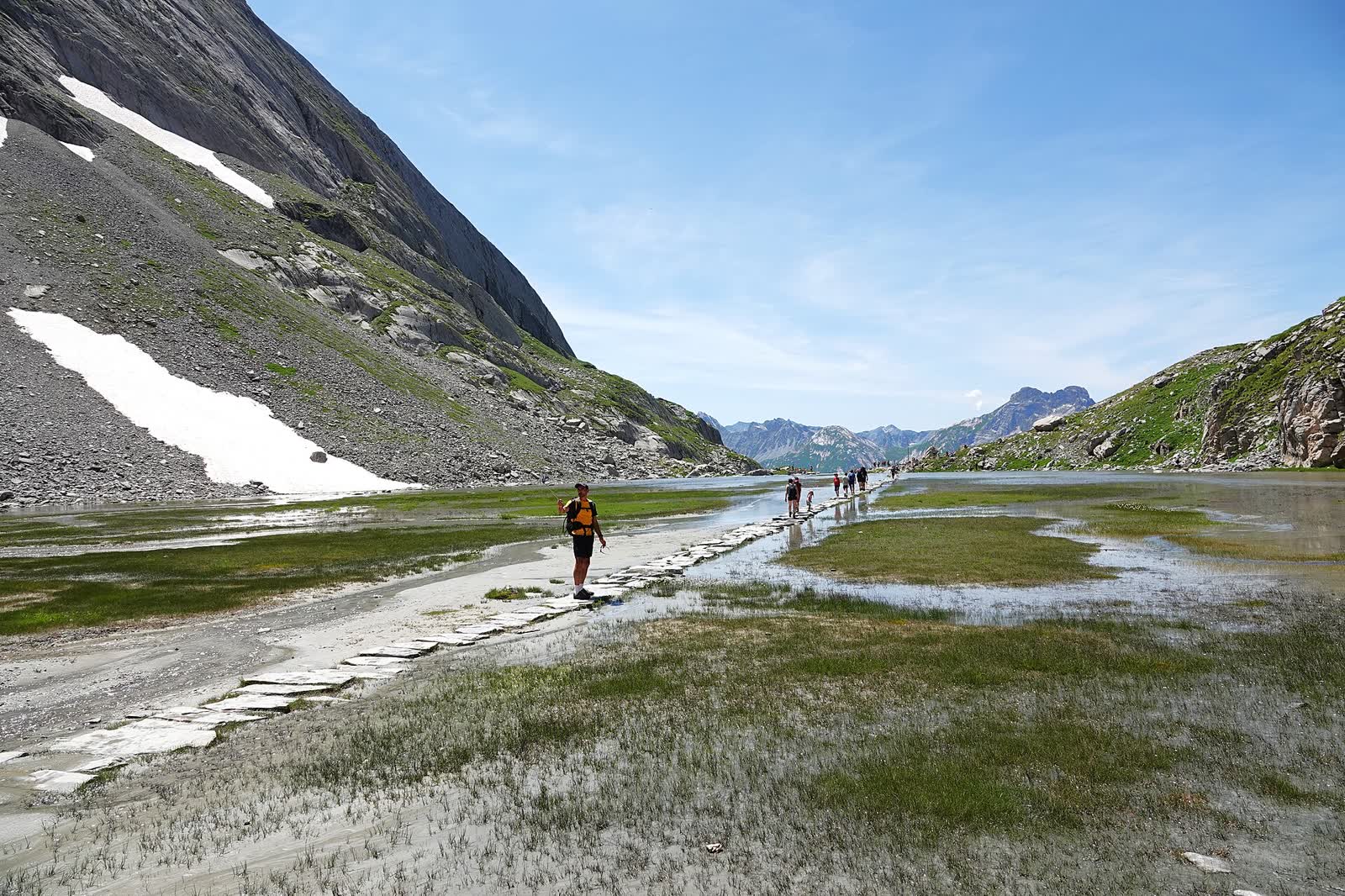 Hiking on a mountain trail in Vanoise National Park in the French Alps