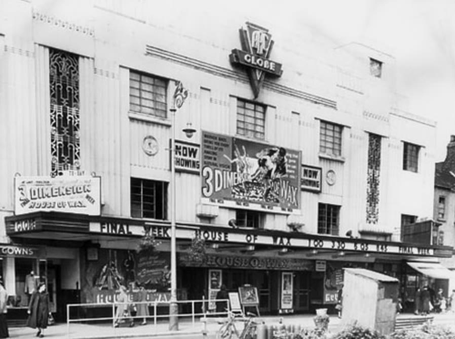Cinema front with a marquee advertising the 3-D film House of Wax at the Globe in Stockton-on-Tees, England, 1953
