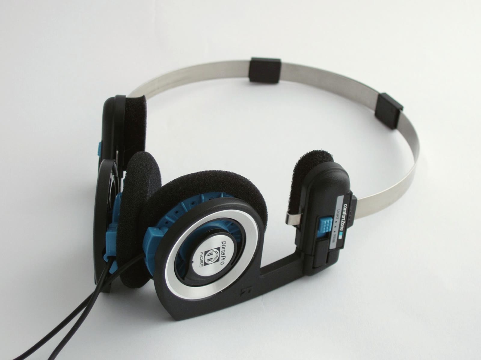 Koss Porta Pro headphones with blue and black ear pads and a thin metal headband