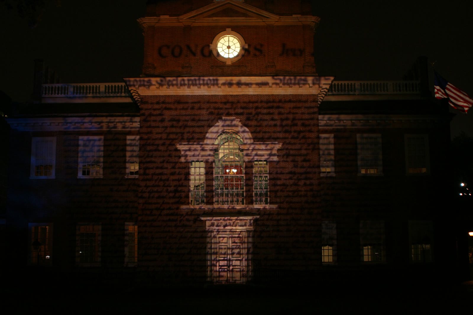 The text of the Declaration of Independence projected onto the south side of Independence Hall at night during the Lights of Liberty show, August 2008