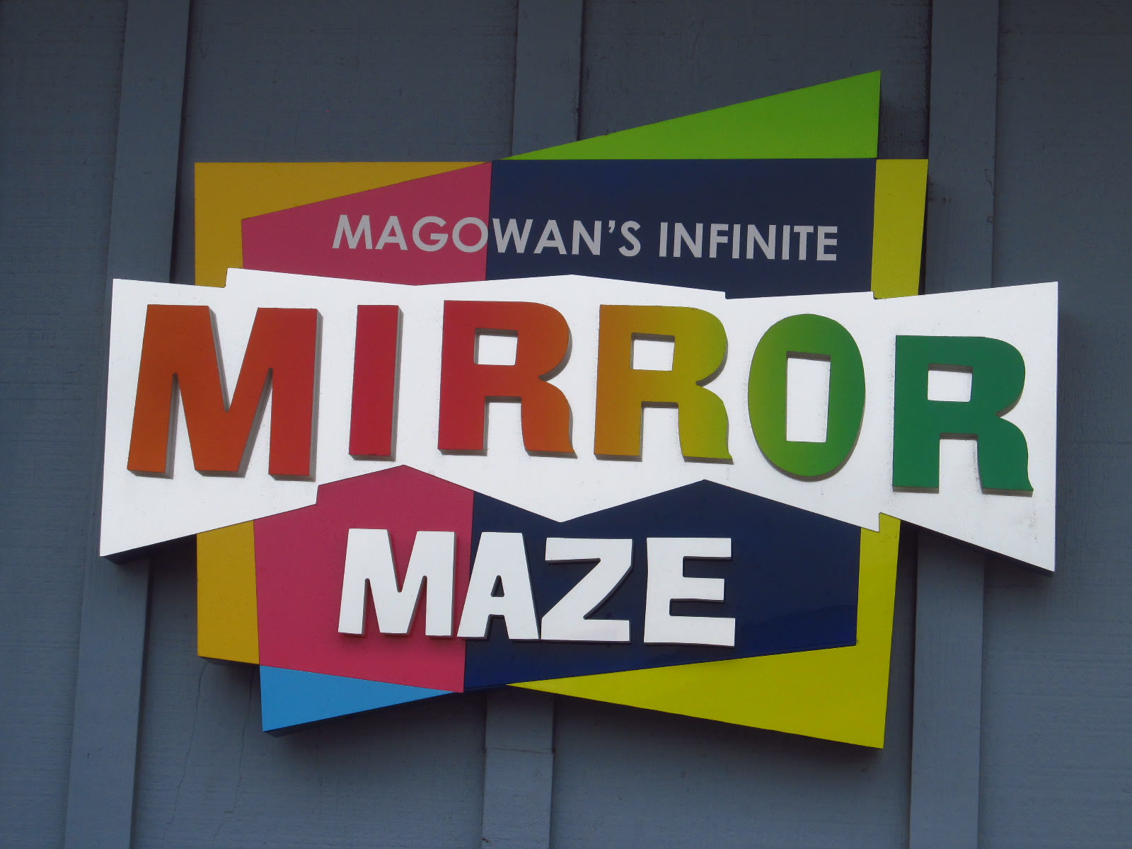 The sign for Magowan's Infinite Mirror Maze at Pier 39, San Francisco, in 2014