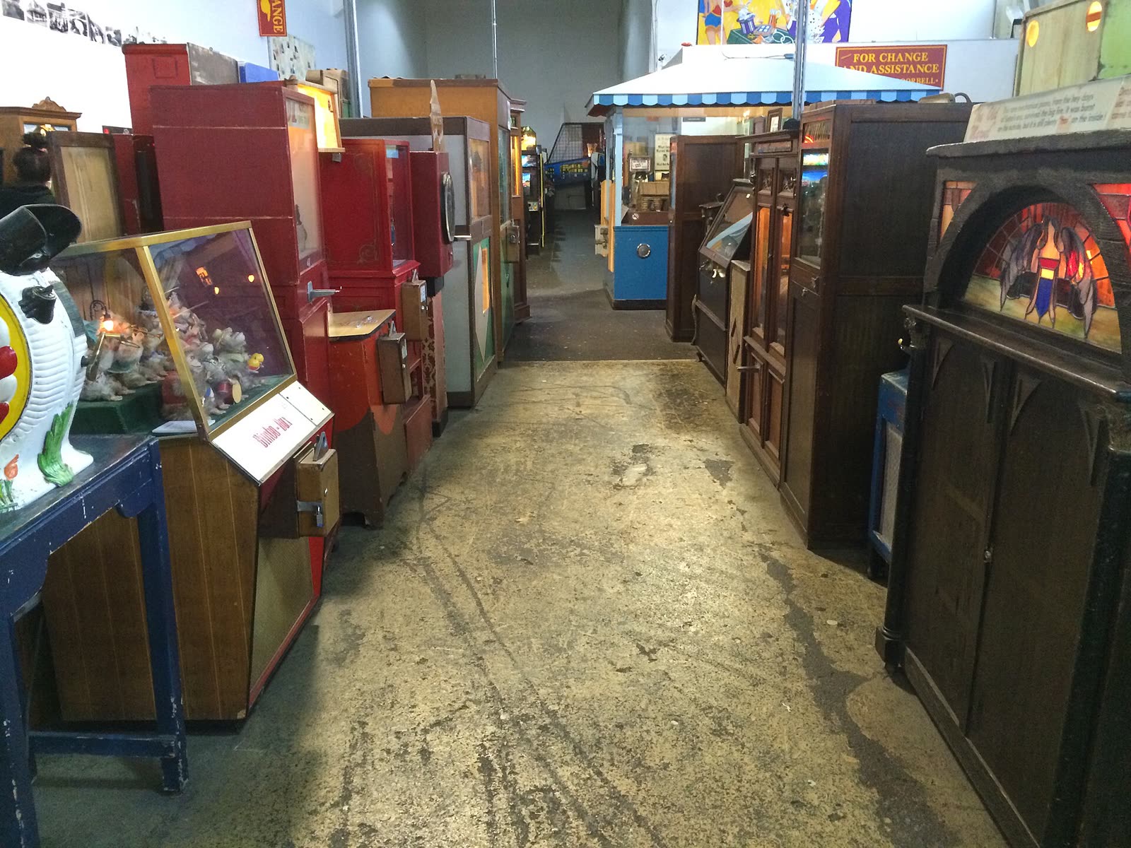 A row of antique coin-operated machines inside the Musée Mécanique, photographed in 2015