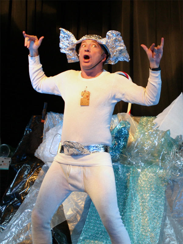 Paul Zaloom performing on stage in November 2004