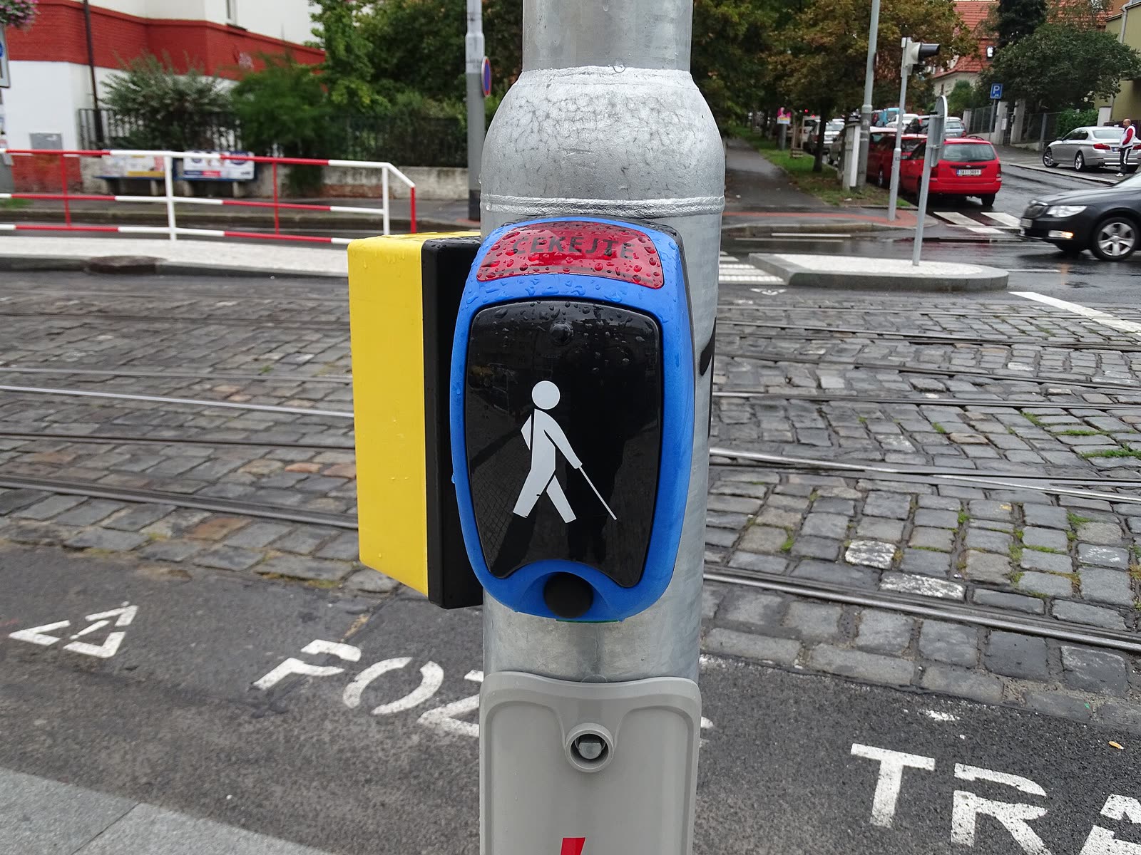 Pedestrian crossing push button for blind walkers on a Prague street