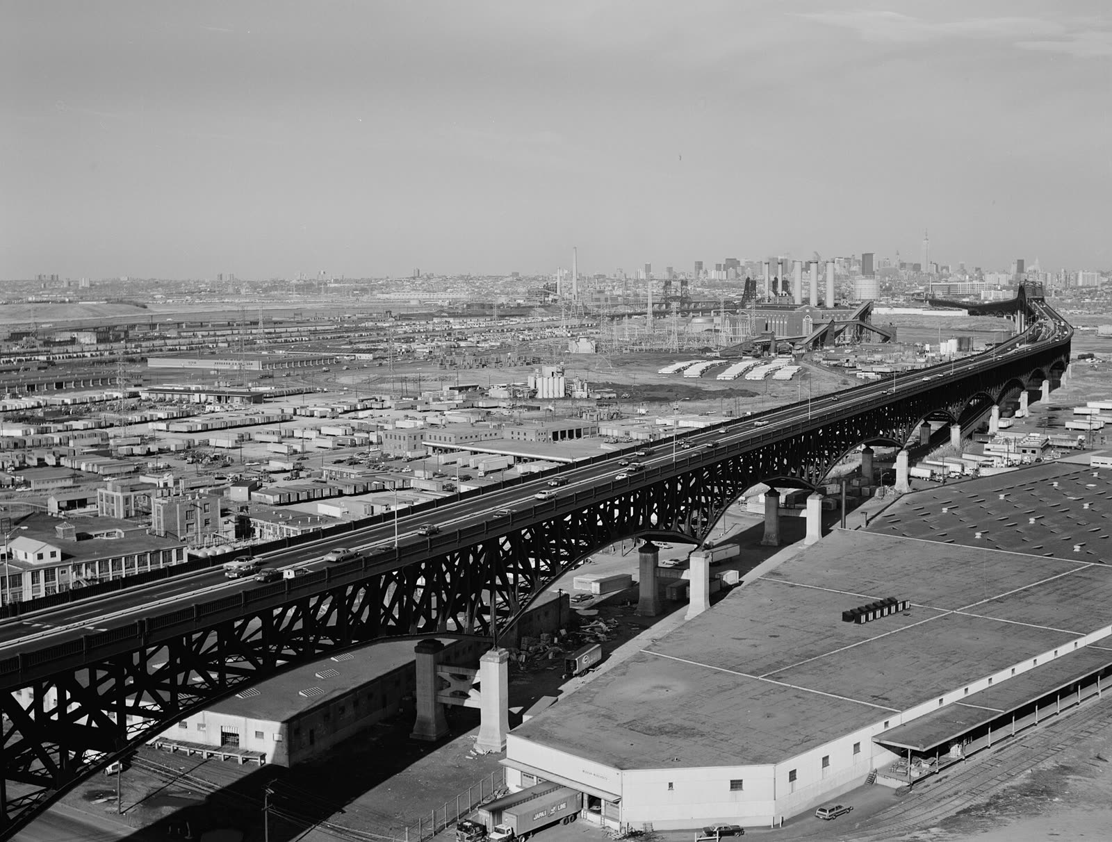 Black and white photograph of the steel Pulaski Skyway crossing above Kearny, New Jersey