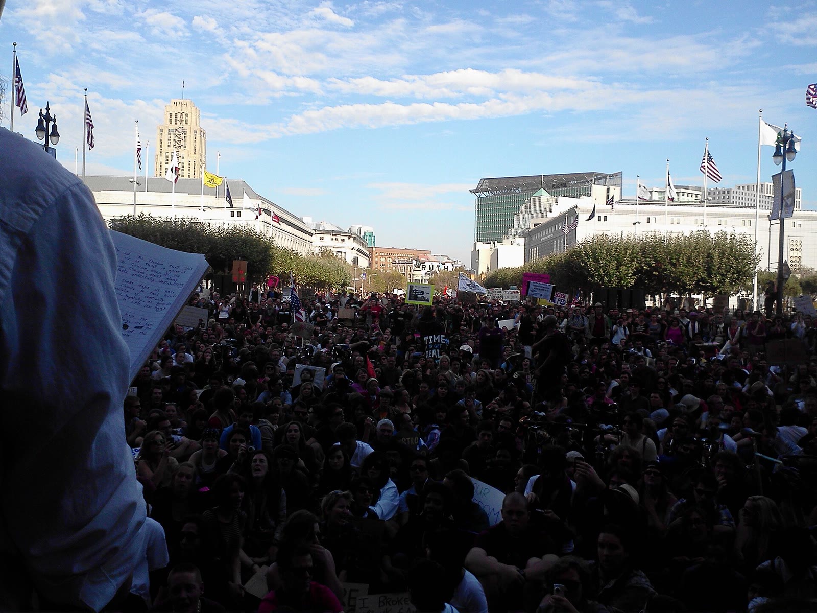 A crowd from Occupy San Francisco listening to a speaker on the steps of San Francisco City Hall, October 2011