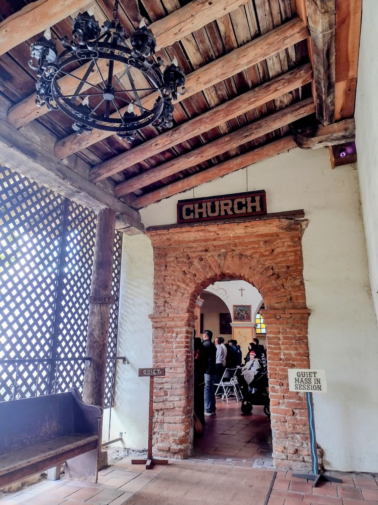The entrance to the Mission San Juan Bautista church in February 2022