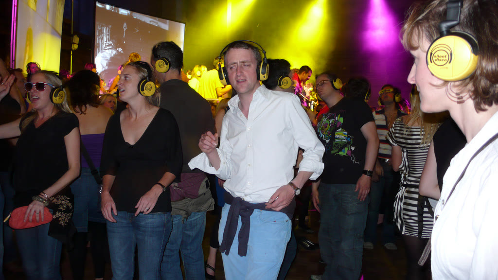Dancers in wireless headphones at a silent disco in McEwan Hall, Edinburgh, during the 2009 Fringe