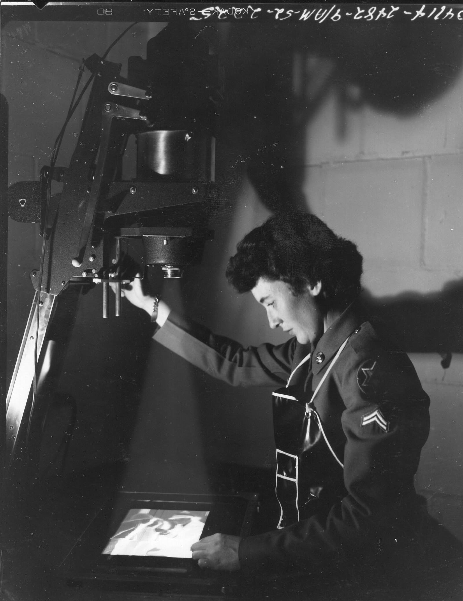 Army corporal Joan Mansfield at work as a photography technician in the Sixth Army laboratory at the Presidio in 1952