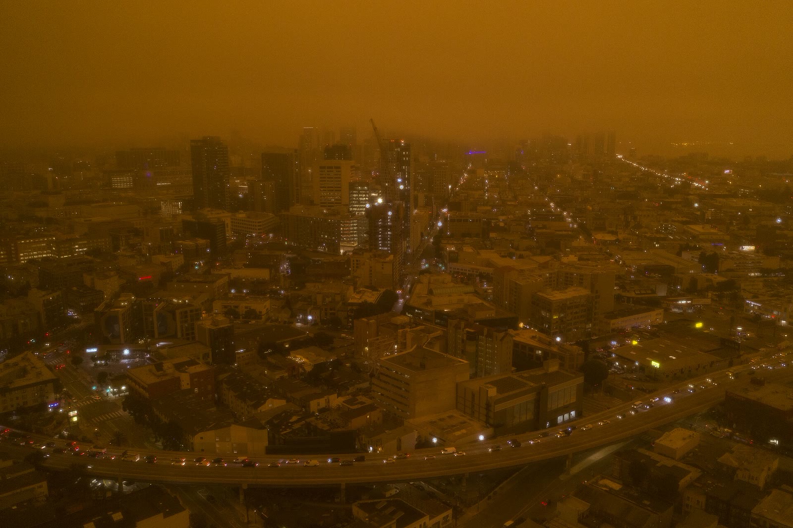 South of Market and the Central Freeway under an orange sky darkened by wildfire smoke