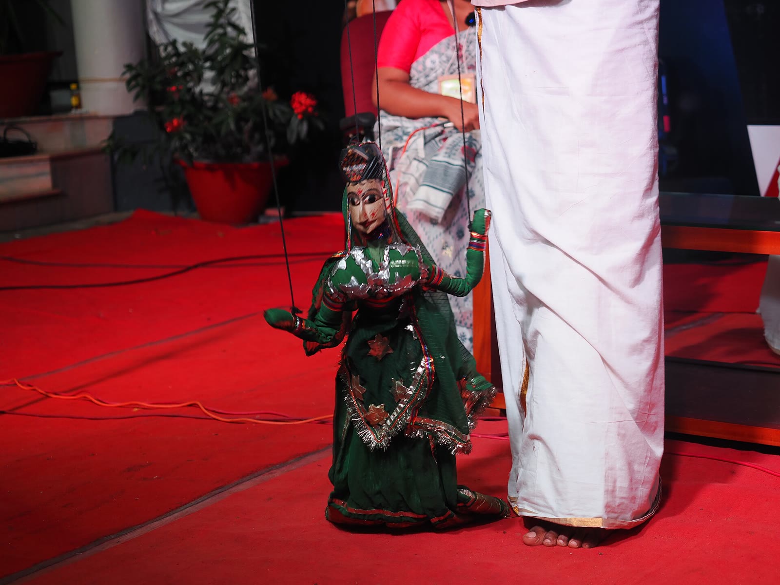 A carved string puppet at a puppetry demonstration in Kottayam