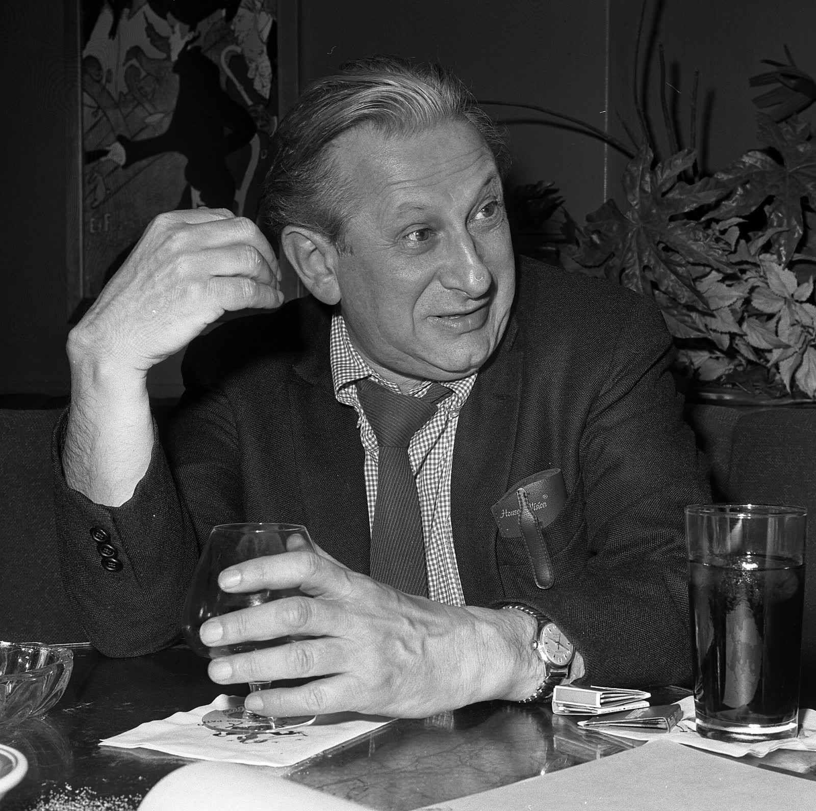 Studs Terkel seated at a restaurant table in Los Angeles in 1970