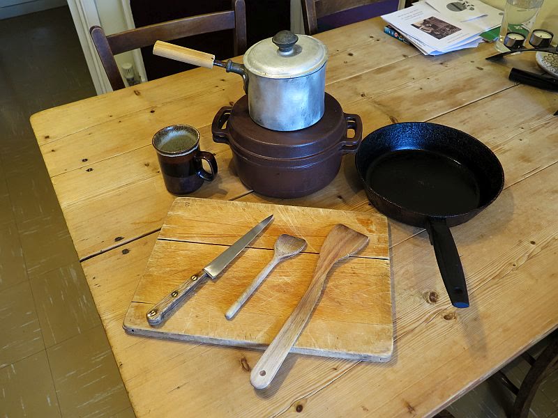 A set of ordinary pans and kitchen utensils about forty years old