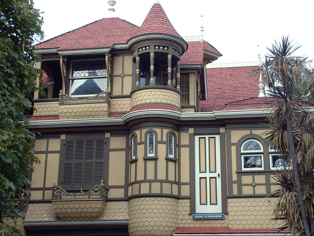 Upper-storey door opening onto a sheer drop on the outside wall of the Winchester Mystery House