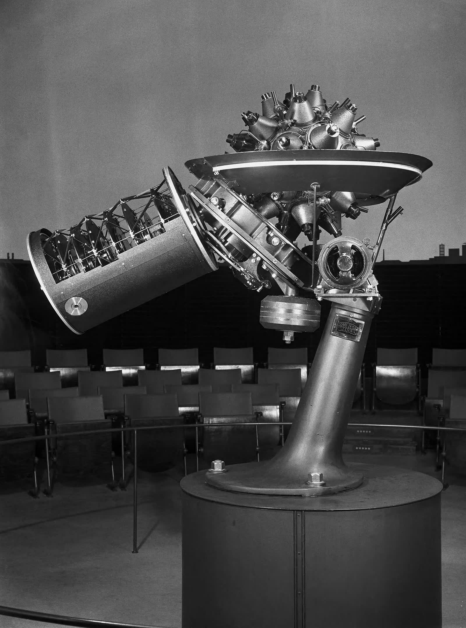 The Zeiss Model I planetarium projector, a metal housing studded with lenses, from about 1925